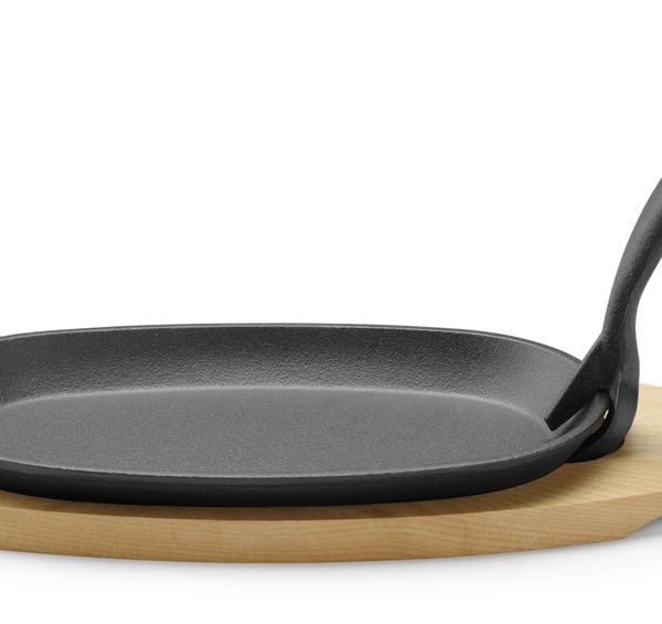 Cast iron platter with wooden underliner and gripper