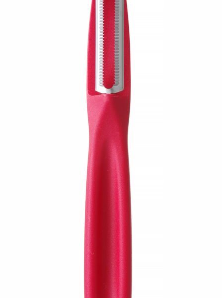 Universal peeler with serrated blade