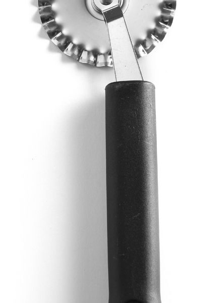 Dough cutter serrated blade